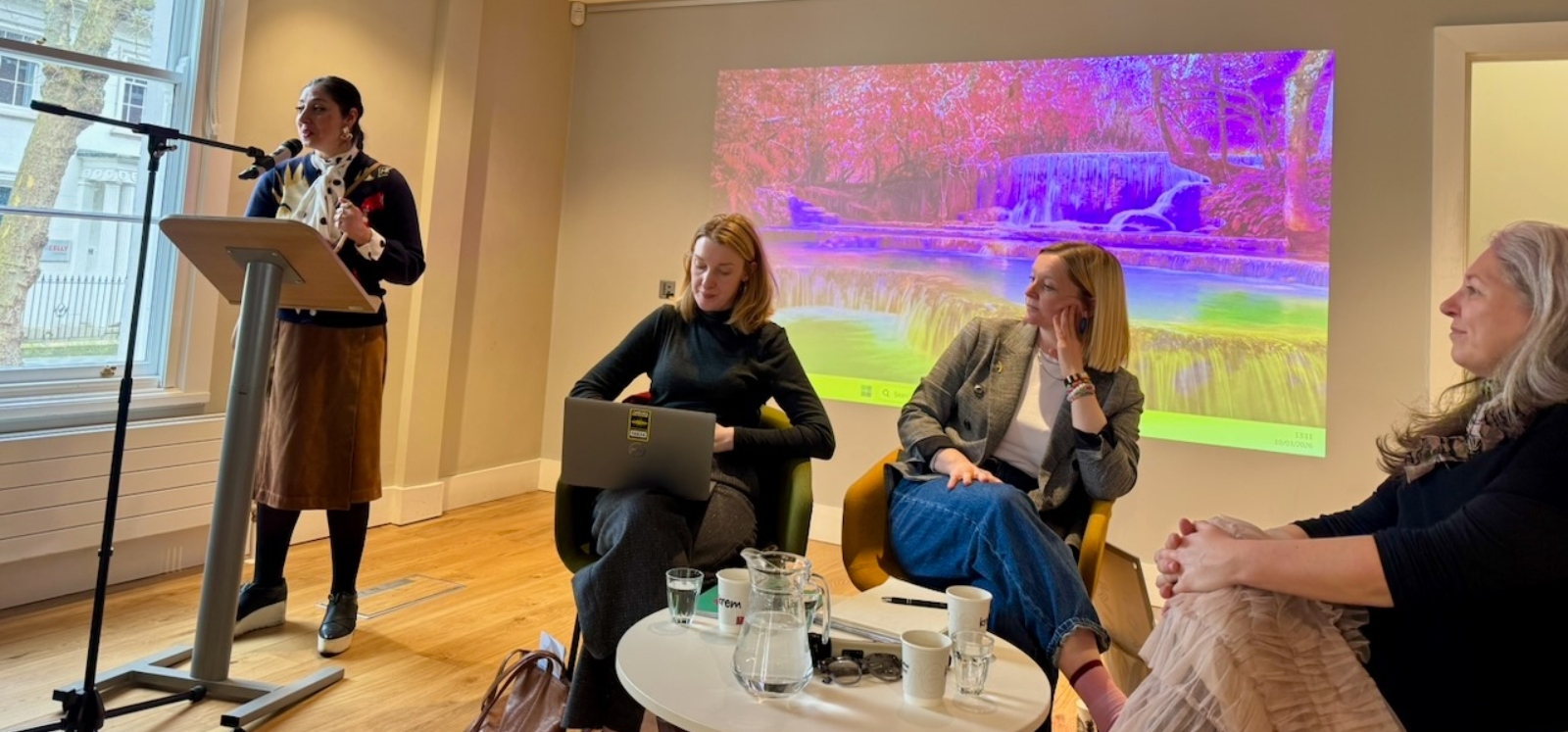 four women hosting a discussion panel